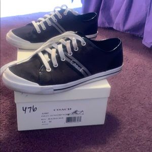 Black and white Coach shoes